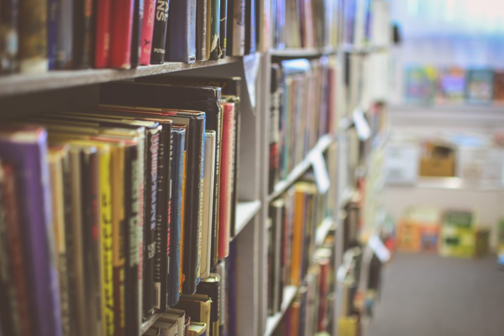 Books on a shelf in a library