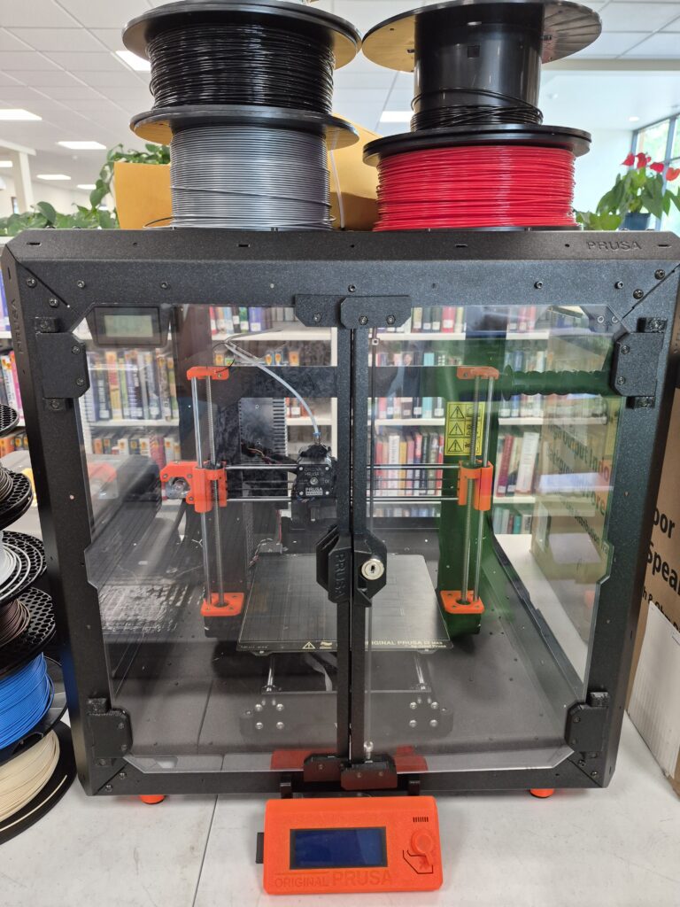 Prusa i3 MK3.5/S 3D Printer and Enclosure with lock (& keys). The 3D printer needs some work. Comes with some supplies and filament. $250 minimum bid.