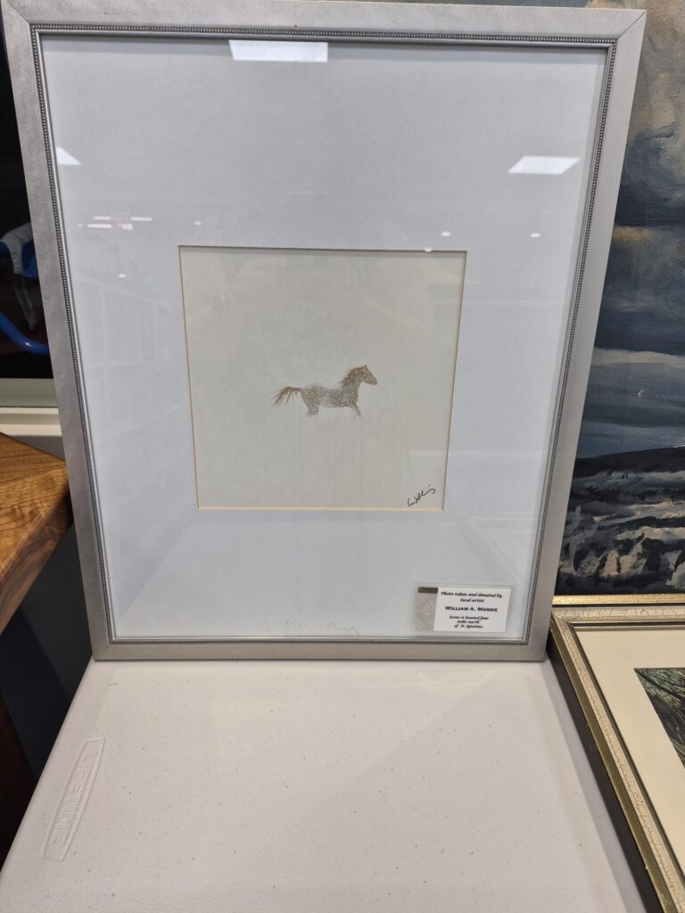 Photograph of a brown horse near St. Ignatius